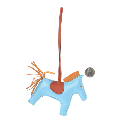 Hermes Milo Lambskin Grigri Rodeo Horse Bag Charm MM Celeste Naturel Bouton D'Or Cornaline 2 of 4