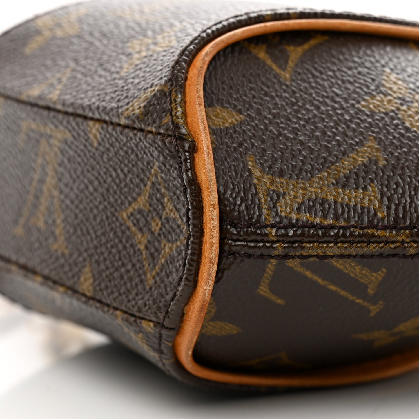 Monogram Mini Ellipse Wristlet Clutch