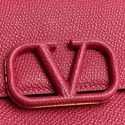 Valentino Garavani Grainy Calfskin Large Vlogo Clutch Raspberry 10 of 11