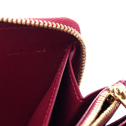 Louis Vuitton Ostrich Zippy Wallet Magenta 7 of 8