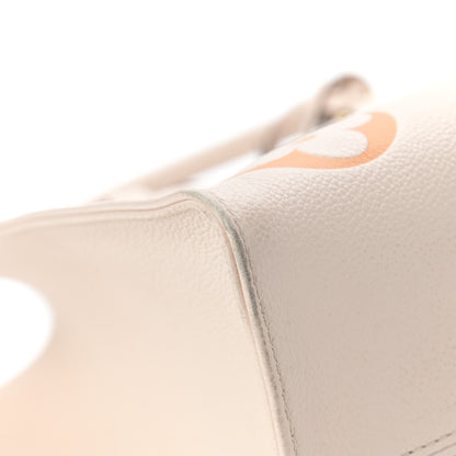 Louis Vuitton Empreinte Monogram Giant By The Pool Onthego MM Cream Saffron 9 of 18