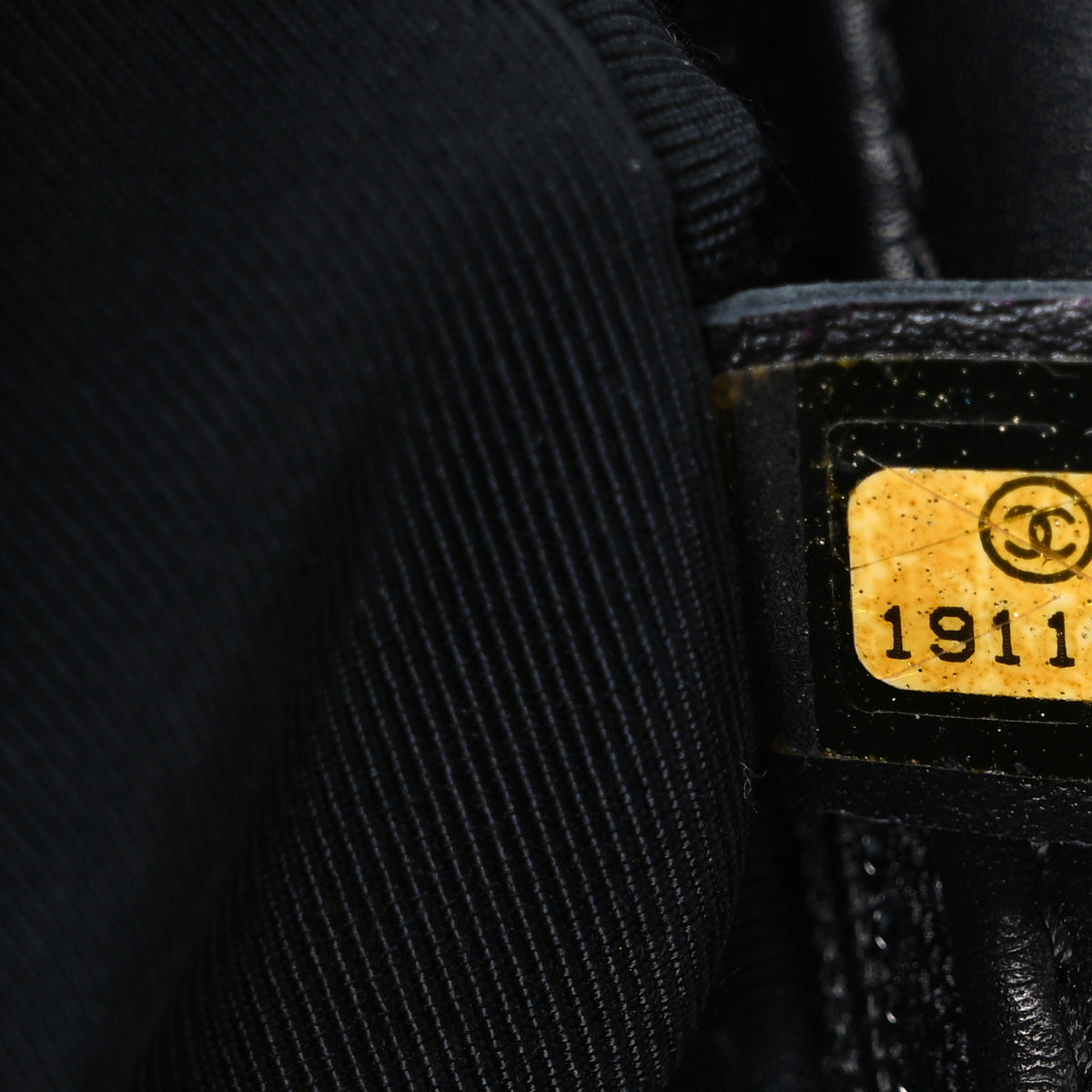 Lambskin Perforated Jumbo Punch Flap Black
