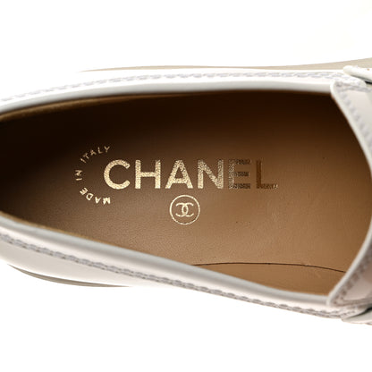 Chanel Shiny Calfskin Logo Loafers 37.5 White 6 of 9