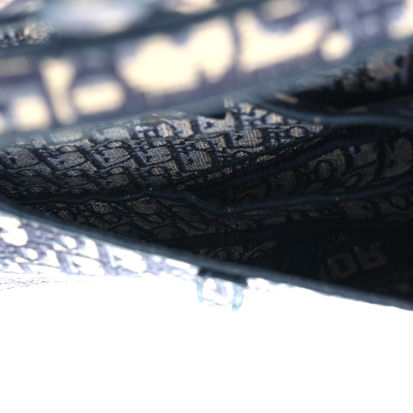 Oblique Embroidered Saddle Bag Blue