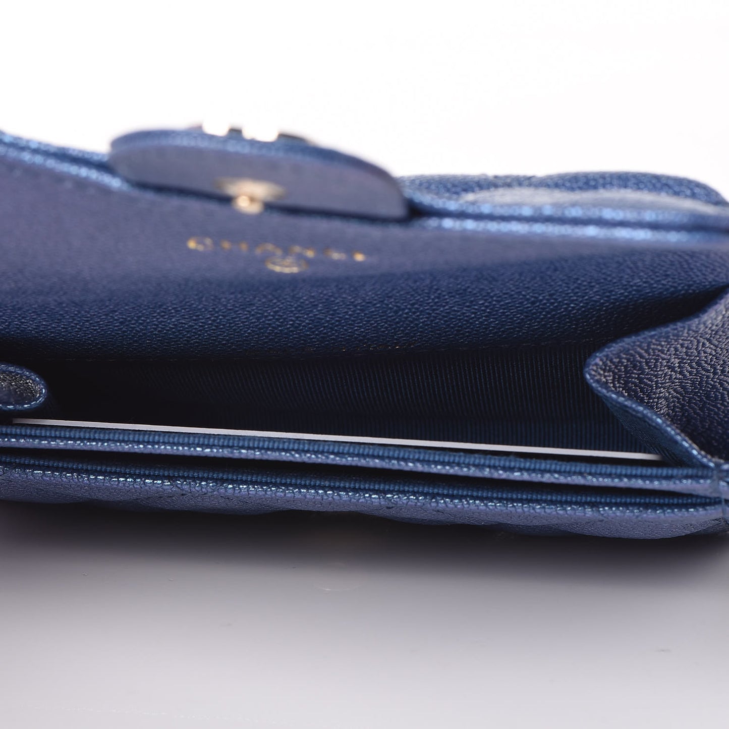 Iridescent Caviar Quilted Flap Card Holder Dark Blue