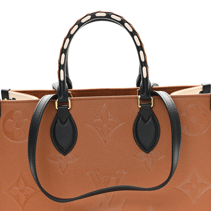 Louis Vuitton Empreinte Monogram Giant Wild At Heart Onthego MM Caramel 7 of 9