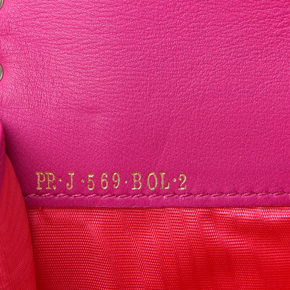 Valentino Garavani Nappa Rockstud Clutch Fuxia 9 of 9