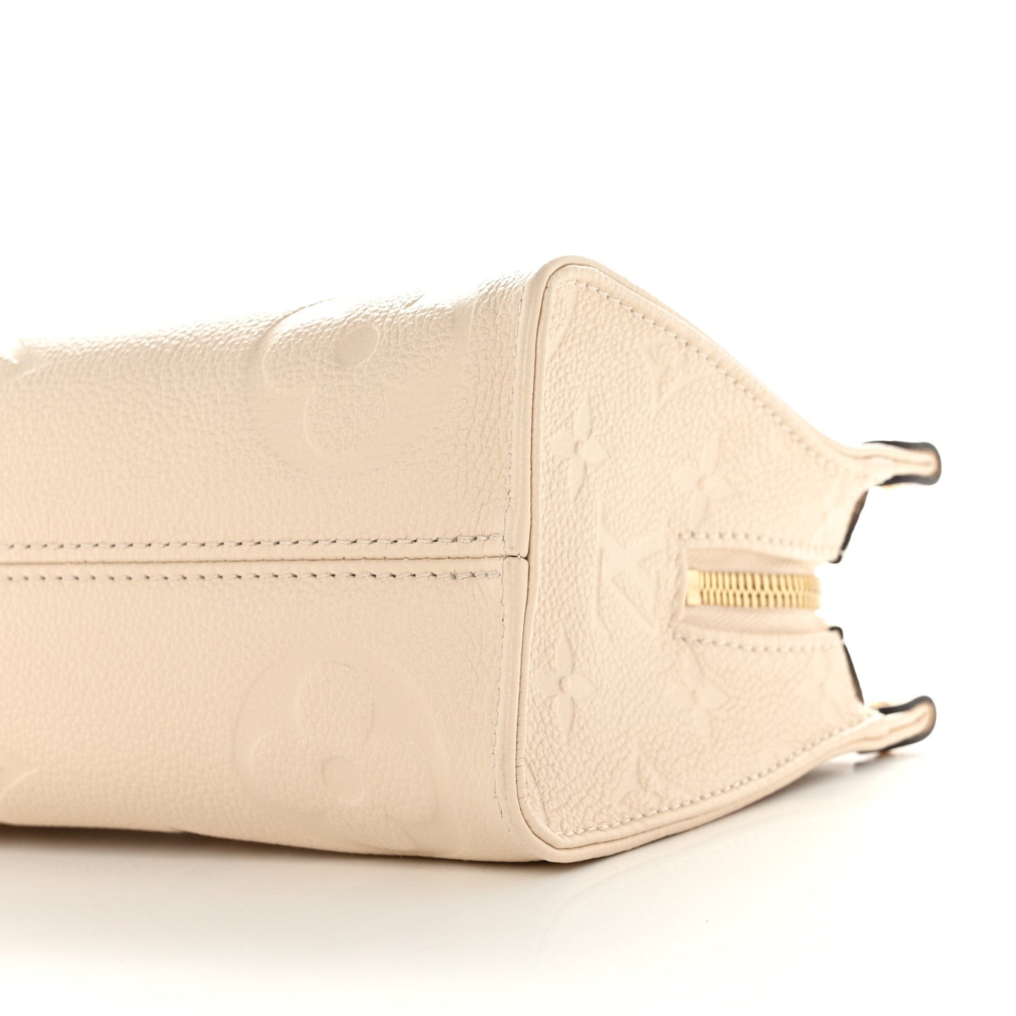 Empreinte Monogram Giant OnTheGo East West Creme