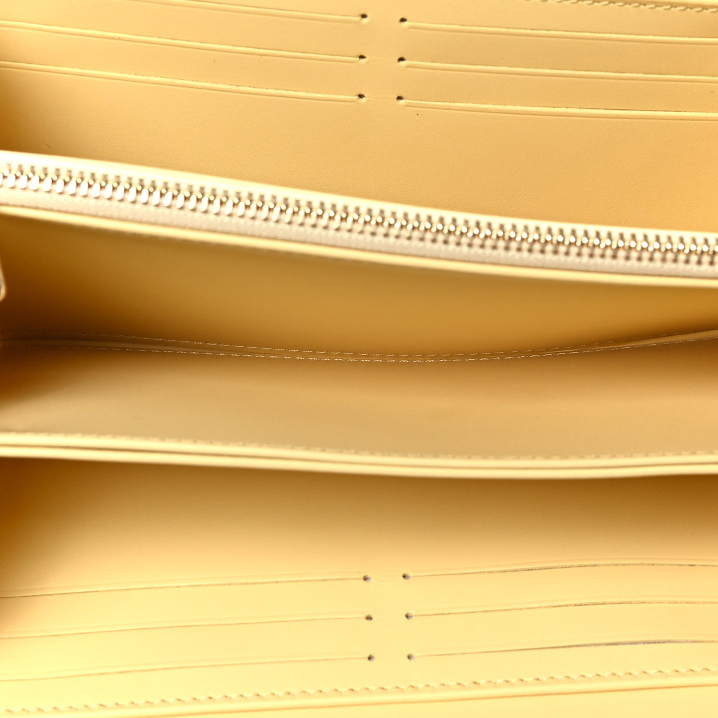 Calfskin Nanogram Embossed Zippy Wallet Jaune