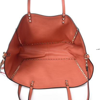Valentino Garavani Pebbled Calfskin Medium Rockstud Reversible Tote Light Cuir Coral 9 of 11