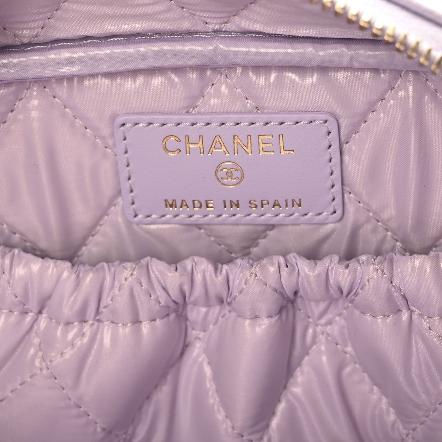 Caviar Quilted Medium Curvy Pouch Cosmetic Case Light Purple