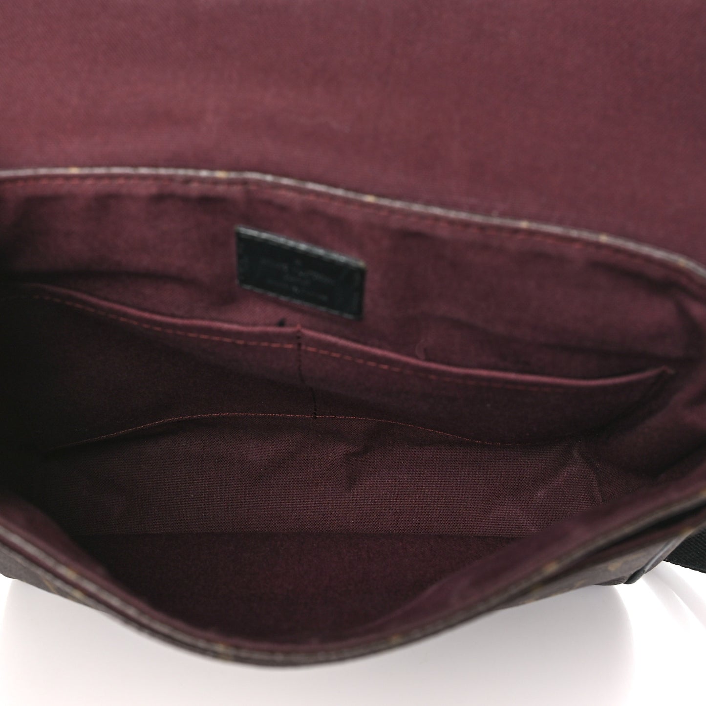 Monogram Macassar District PM