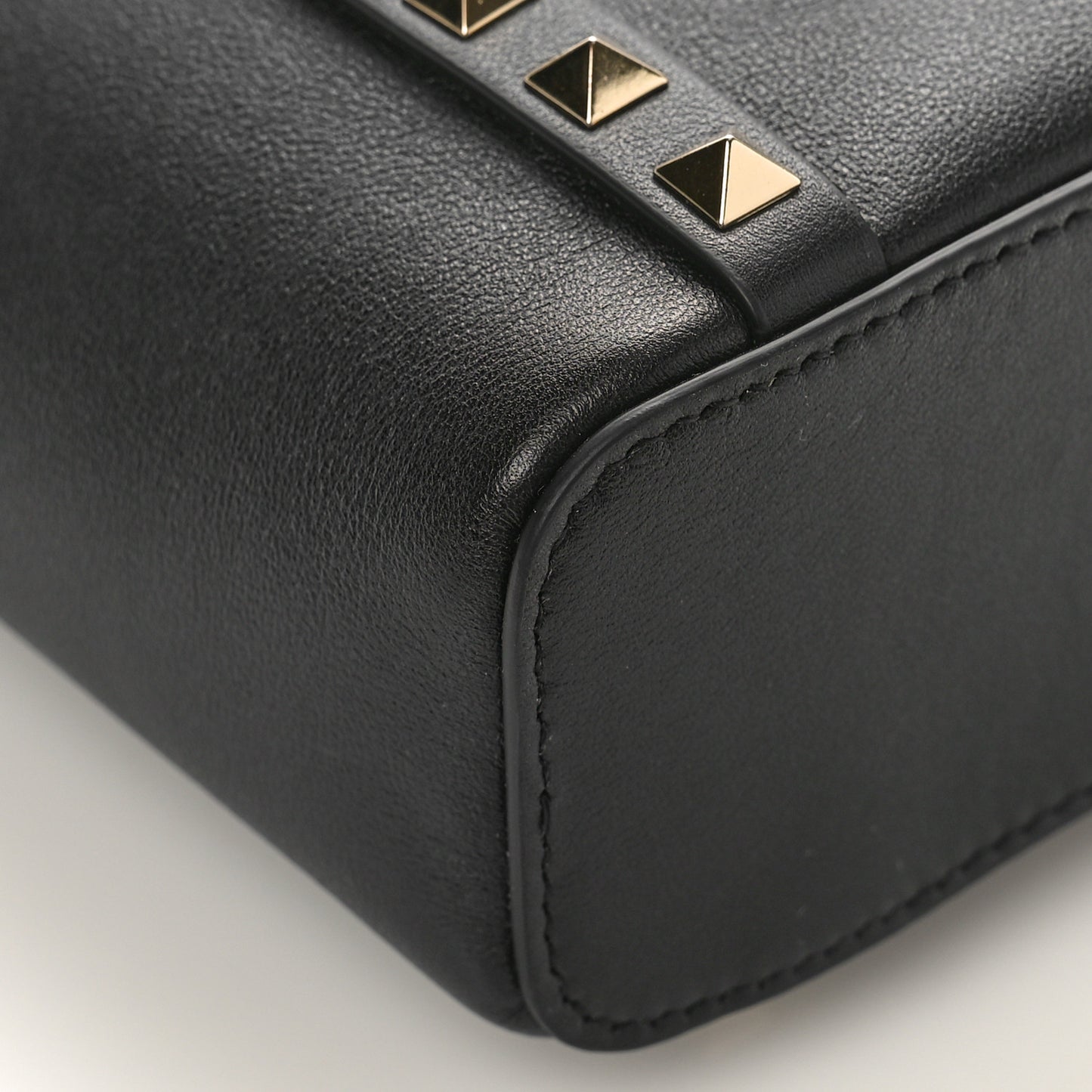 Pebbled Calfskin Rockstud North-South Crossbody Bag Black