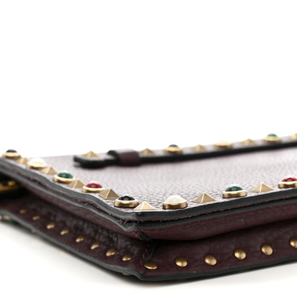 Valentino Garavani Pebbled Calfskin Rockstud Rolling Wristlet Clutch  Rubin 10 of 13