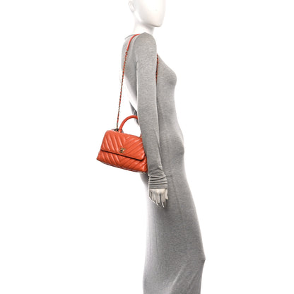 Chanel Aged Calfskin Chevron Quilted Mini Coco Handle Flap Orange 2 of 10
