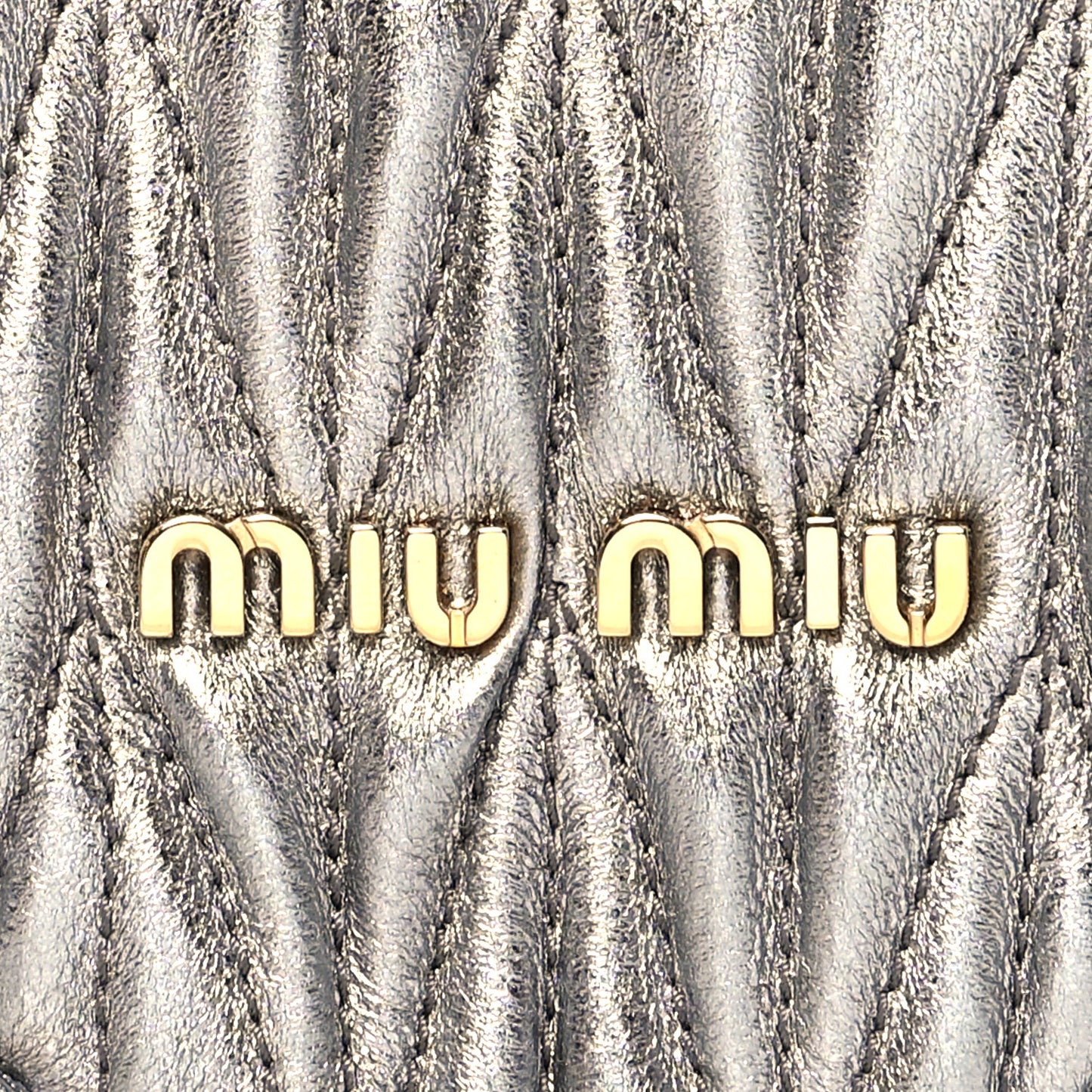 Metallic Nappa Matelasse Heart Wristlet Pouch Cromo