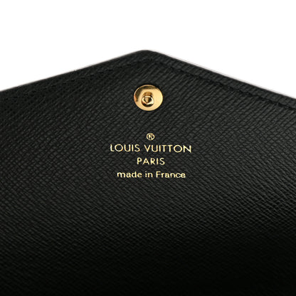 Louis Vuitton LOUIS VUITTON Reverse Monogram Giant Sarah Wallet 6 of 7