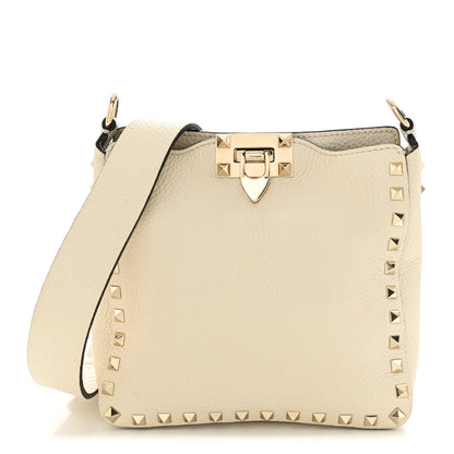 Valentino Garavani Pebbled Calfskin Mini Rockstud Flip-Lock Messenger Bag Light Ivory 1 of 10