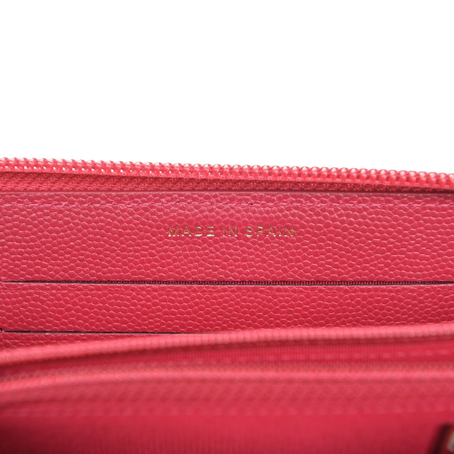 Caviar Quilted Small Boy Zip Around Wallet Fuchisa