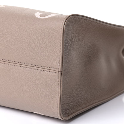 Louis Vuitton Empreinte Monogram Giant Onthego MM Tourterelle Creme 9 of 9