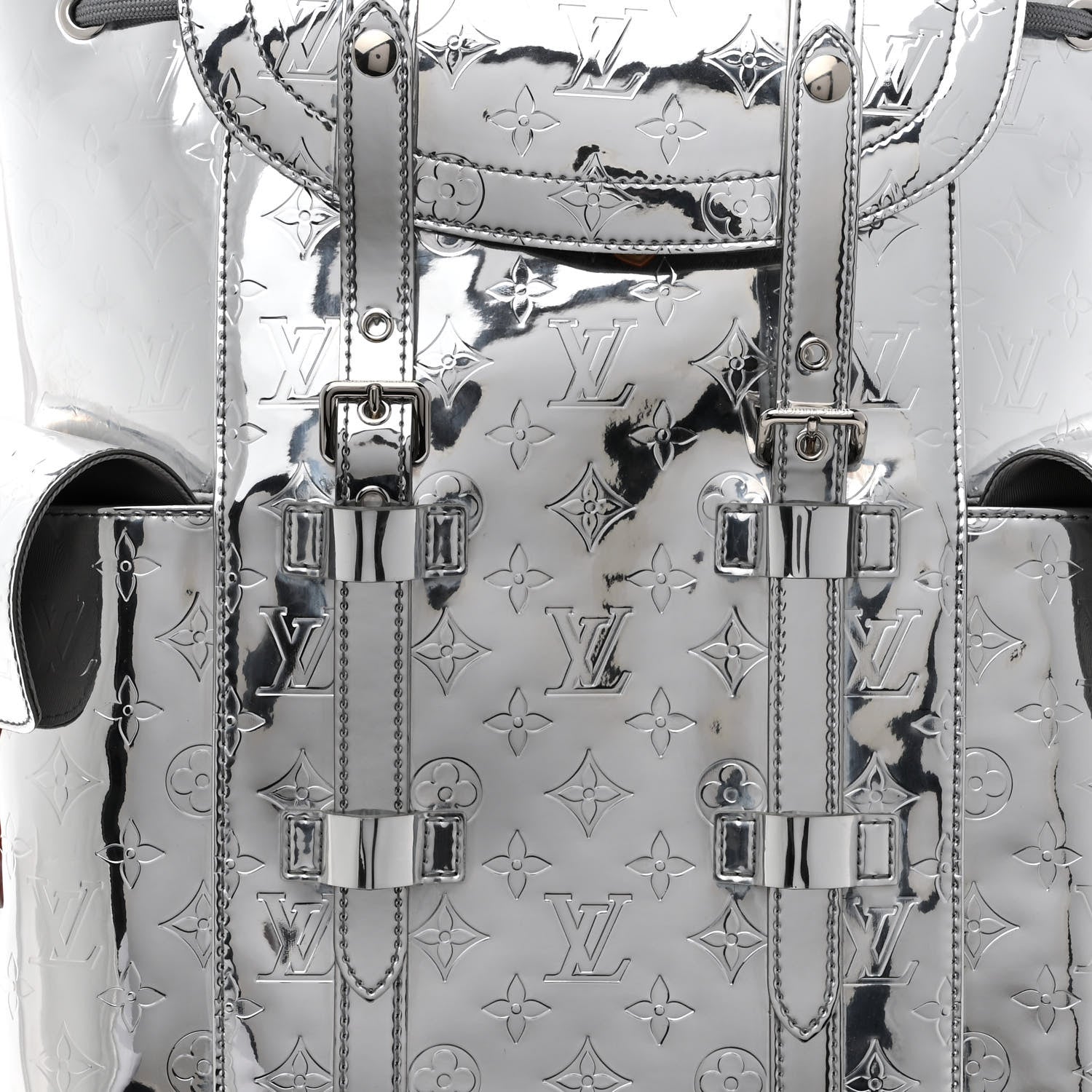 louis vuitton backpack silver Titanium Monogram Savonches The versatile discovery pm backpack is made from monogram coated canvas and taga leather in an understated grey as part of the tagarama leather goods line Louis Vuitton backpack