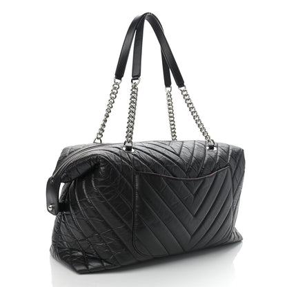 Chanel Aged Calfskin Chevron Quilted Duffle Bag Black 3 of 15