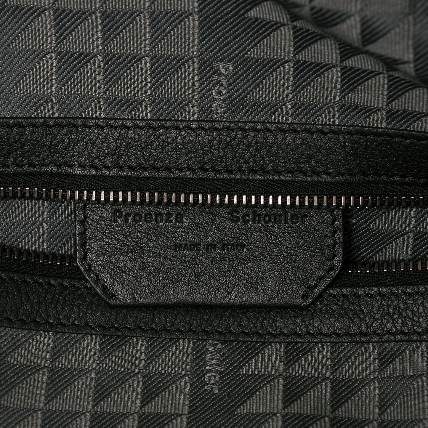 Calfskin Triangle Embossed Travel Bag Black