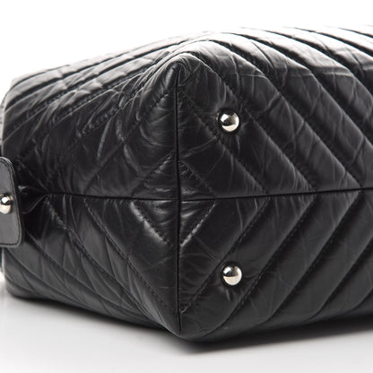 Chanel Aged Calfskin Chevron Quilted Duffle Bag Black 9 of 12