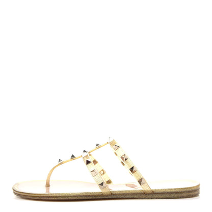 Valentino Garavani PVC Jelly Glitter Rockstud Caged Flat Thong Sandals 40 Oro 1 of 10