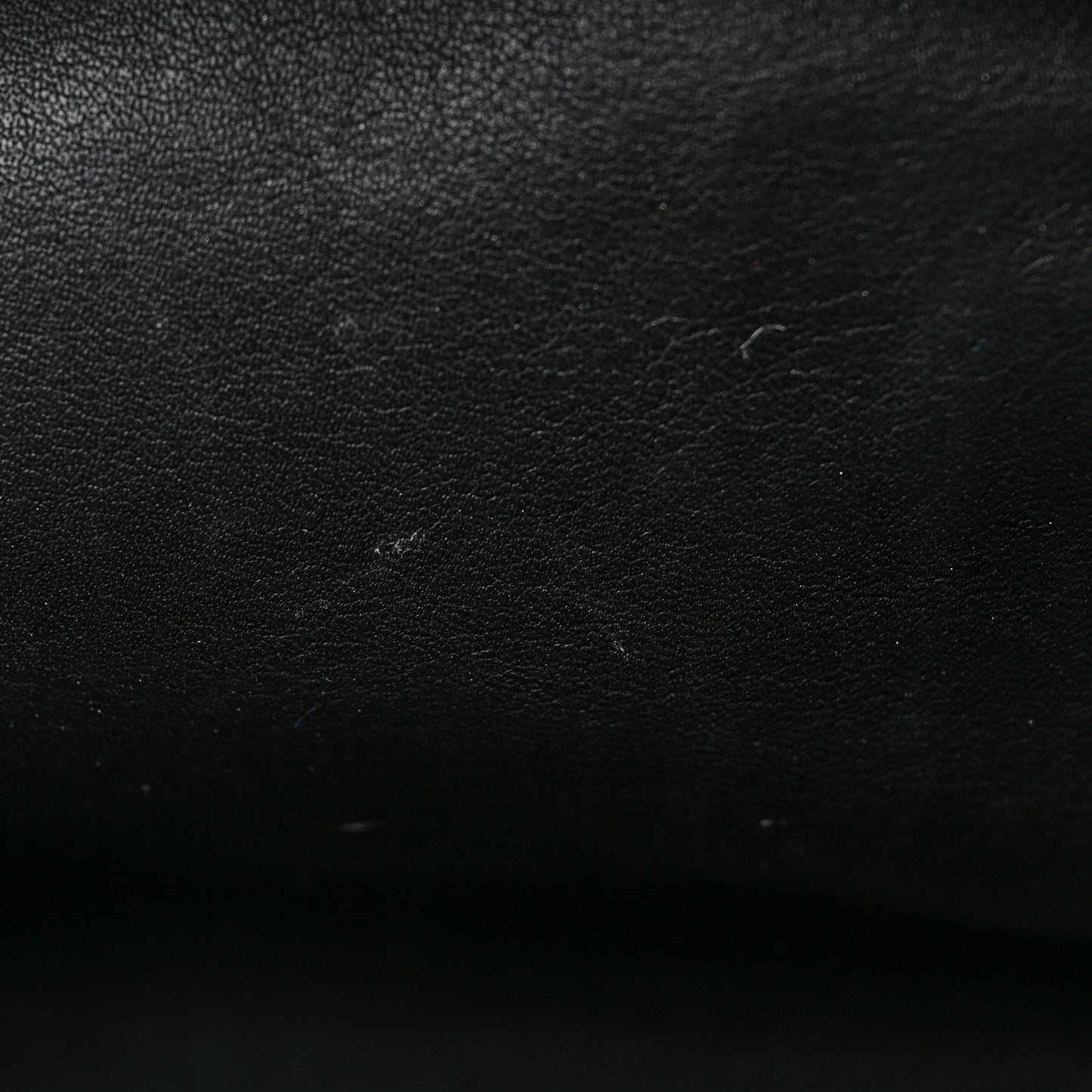 Butter Calfskin The Mini Pouch Black