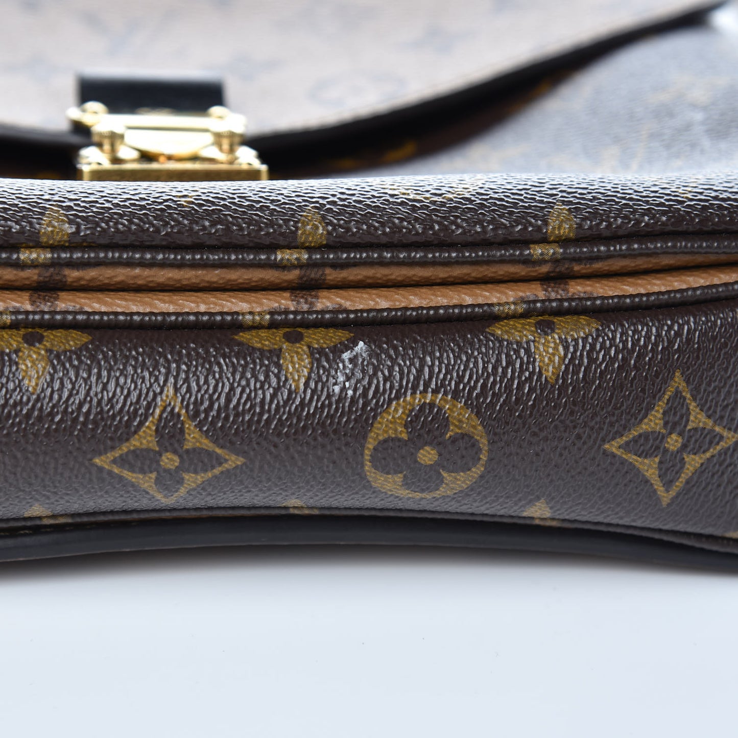 Reverse Monogram Pochette Metis