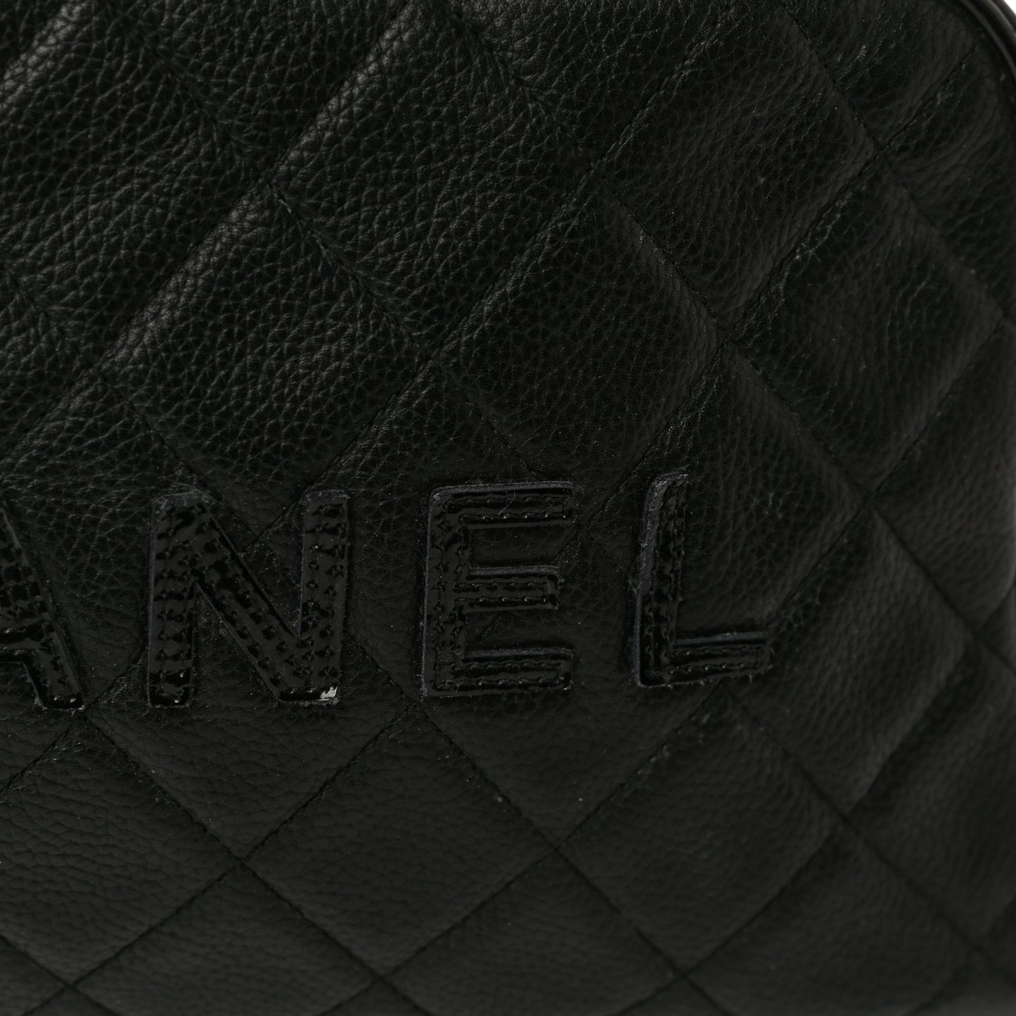 Caviar Patent Quilted Bowler Black