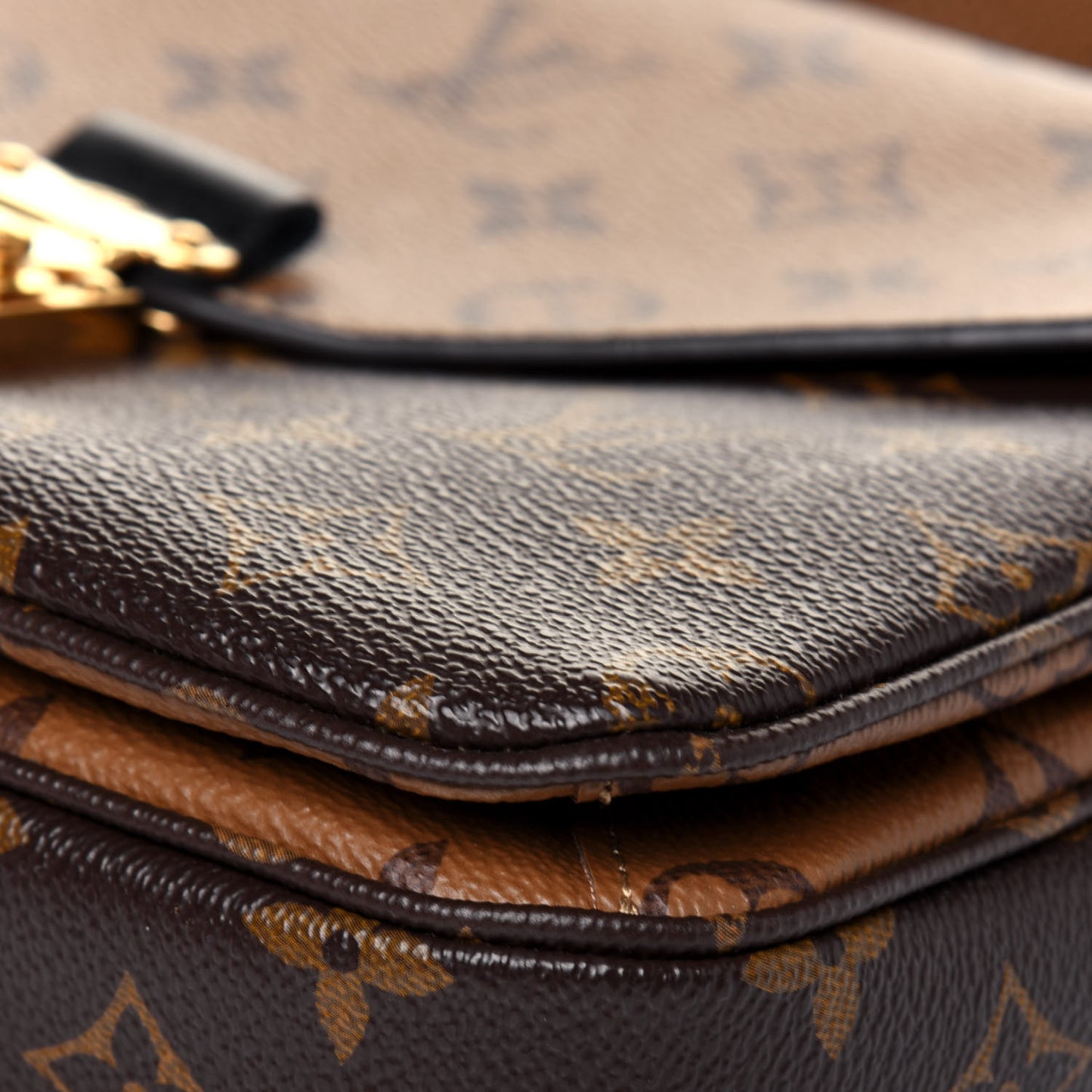 Reverse Monogram Pochette Metis