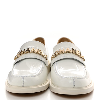 Chanel Shiny Calfskin Logo Loafers 37.5 White 2 of 9