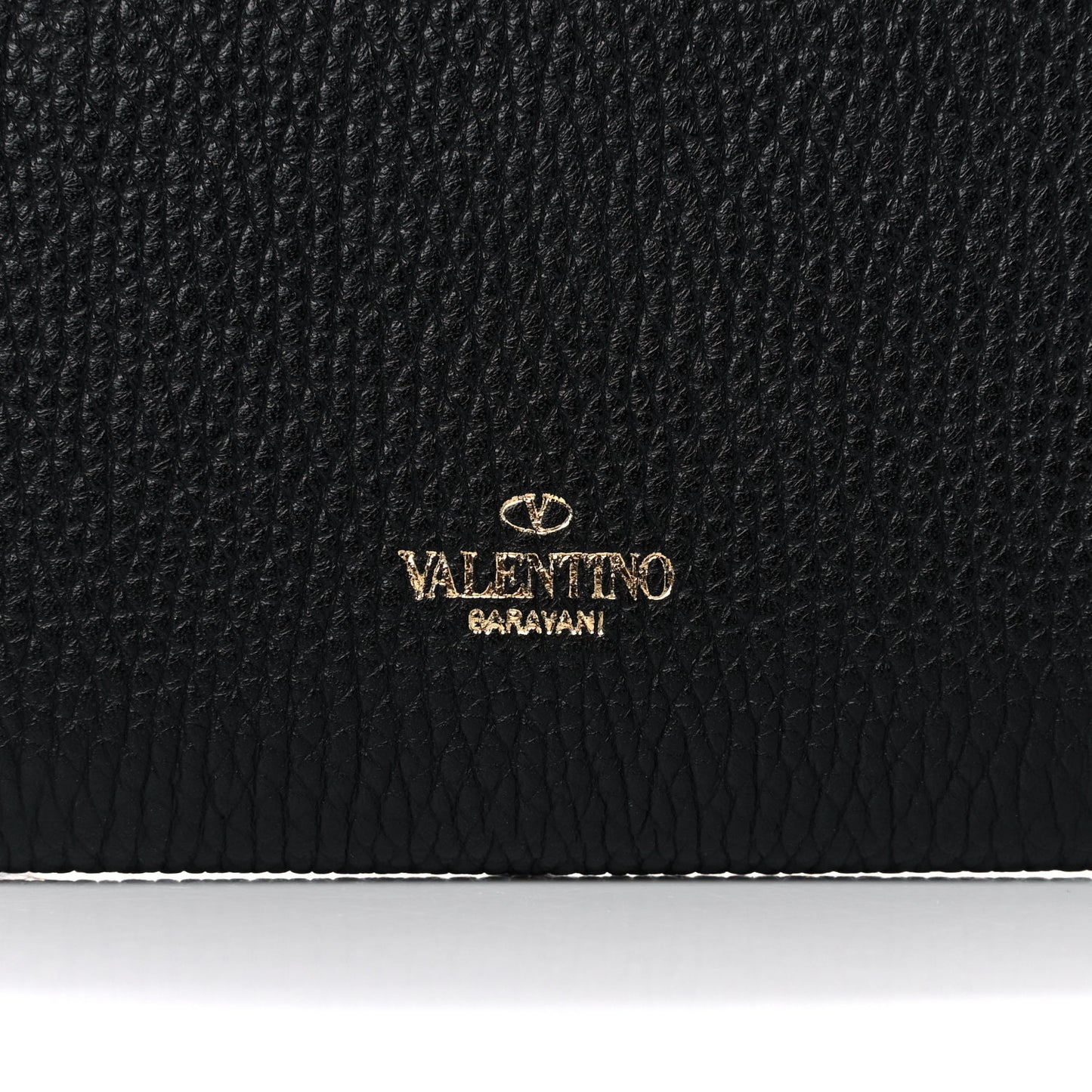 Pebbled Calfskin Rockstud Flip Lock Wallet On Chain Black