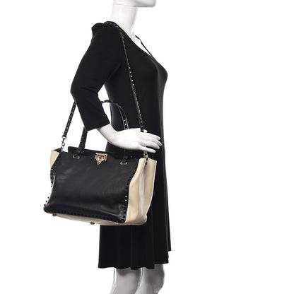 Valentino Garavani Vitello Monochrome Medium Rockstud Tote Black Light Ivory 2 of 16