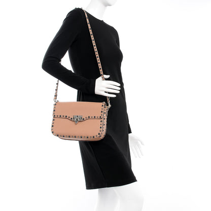 Valentino Garavani Pebbled Calfskin Medium Rockstud Rolling Flap Saddle Bag Soft Noisette 2 of 8