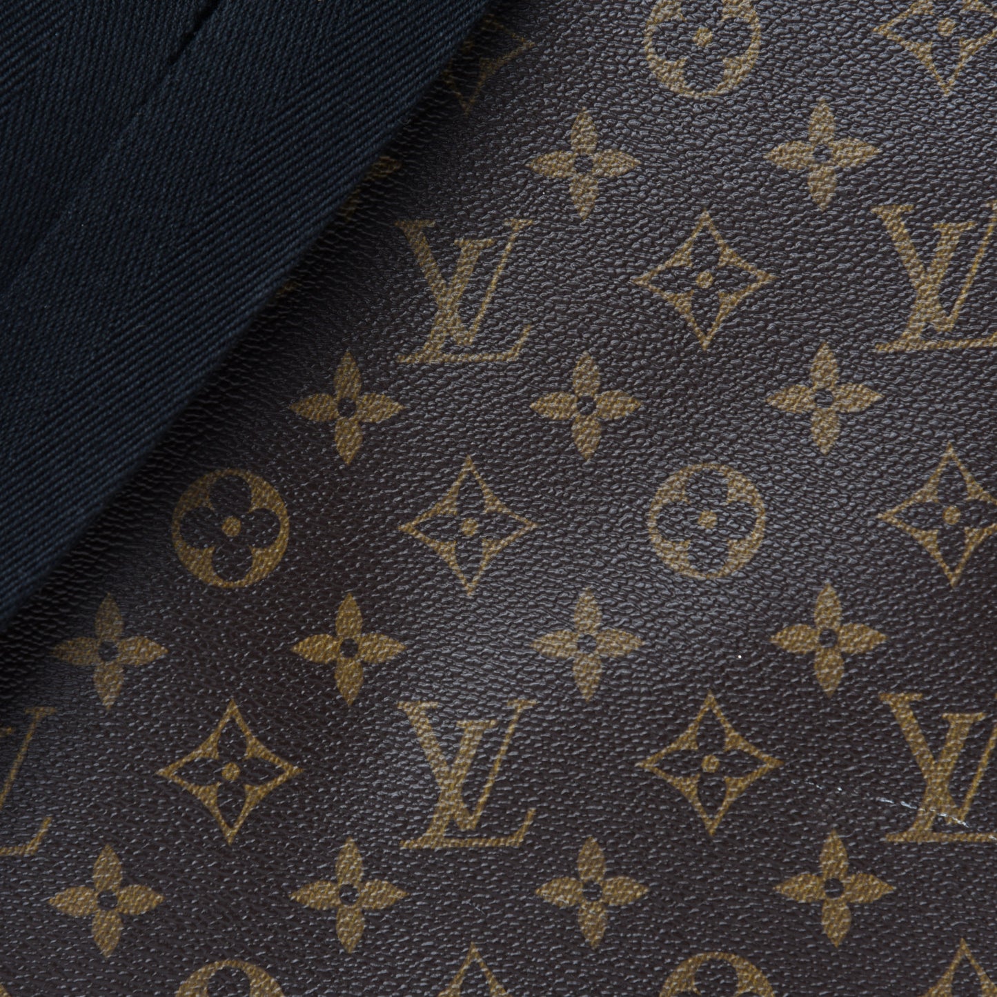 Monogram Macassar District PM