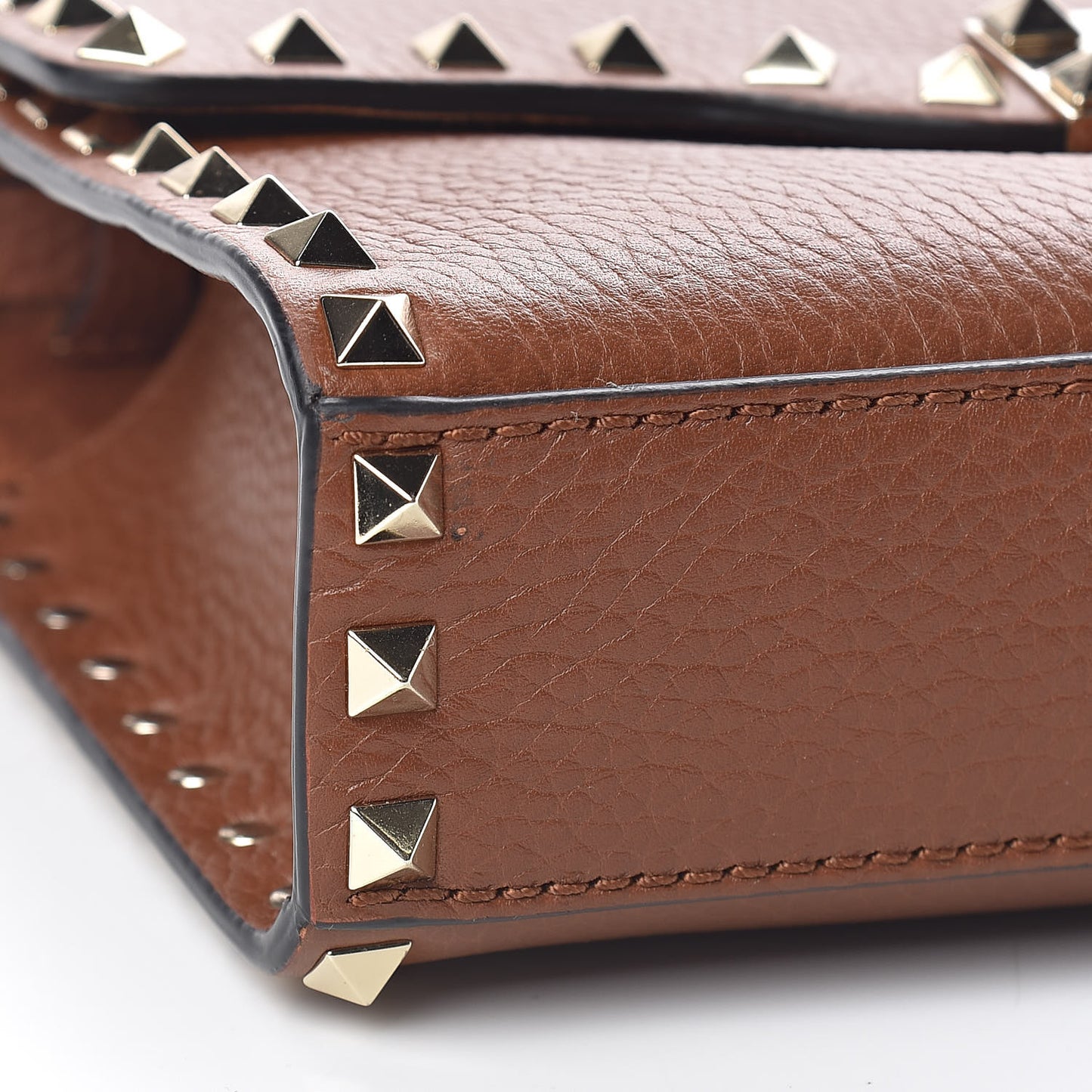 Pebbled Calfskin Medium Rockstud Flip Lock Crossbody Bag Bright Cognac