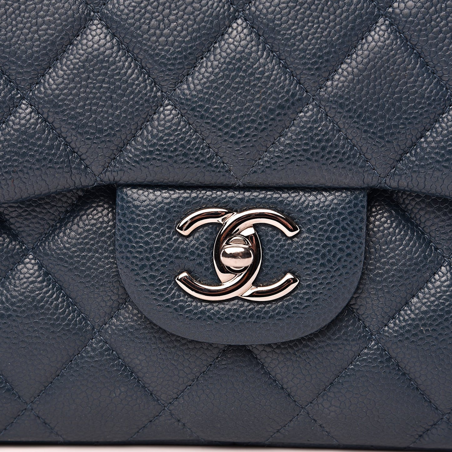 Caviar Quilted Jumbo Double Flap Dark Blue