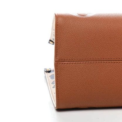 Louis Vuitton Empreinte Monogram Giant Wild At Heart Onthego MM Caramel 7 of 8