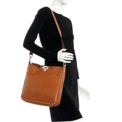Valentino Garavani Pebbled Calfskin Large Rockstud Flip-Lock Messenger Bag Light Cuir 2 of 11
