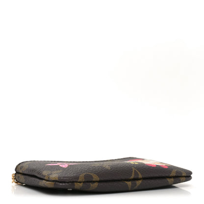 Louis Vuitton Monogram 2024 Christmas Animation Candy Factory Key Pouch Candy Red 4 of 7