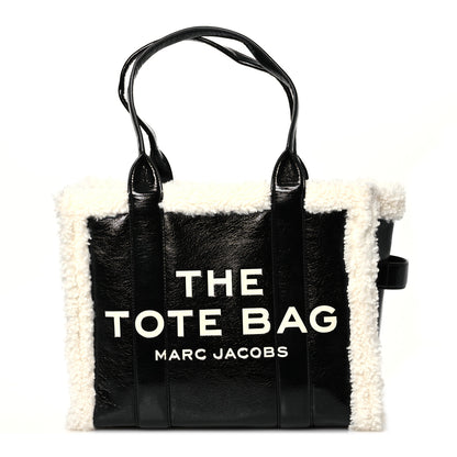 Marc Jacobs Shiny Calfskin Faux Shearling Large The Traveler Tote Bag Black 1 of 12