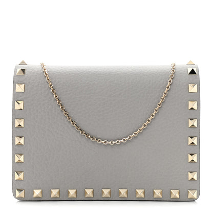 Valentino Garavani Pebbled Calfskin Rockstud Wallet on Chain Pastel Grey 1 of 10