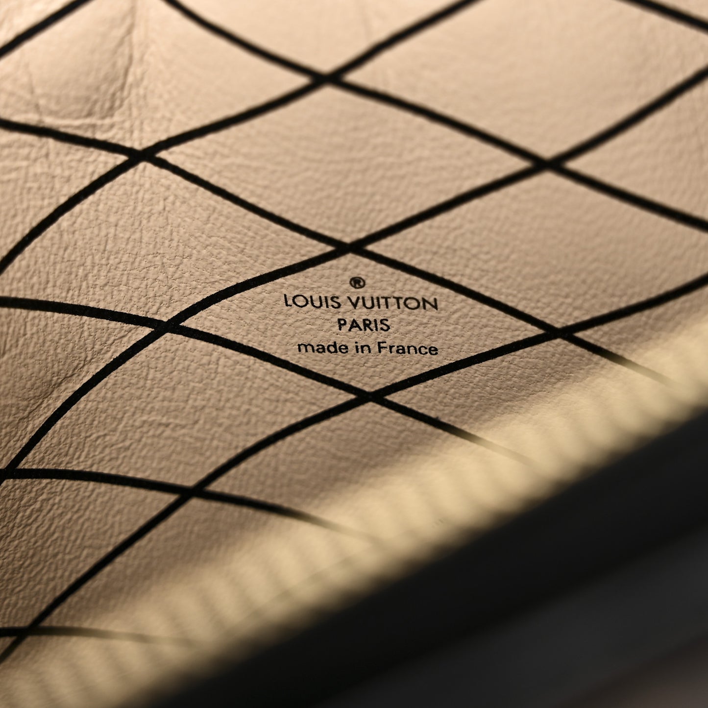 Reverse Monogram Trunk Clutch