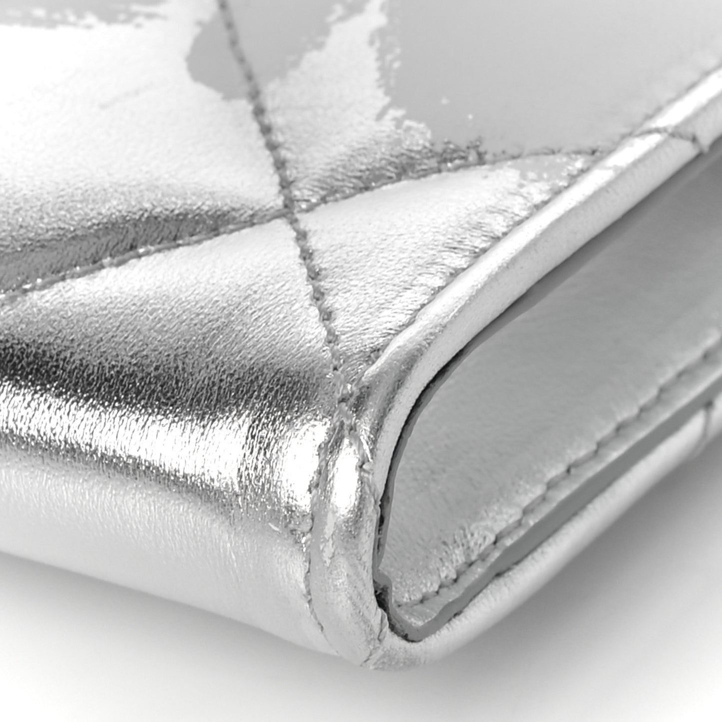 Metallic Calfskin Quilted Four Ring Knuckle Flat Clutch Silver