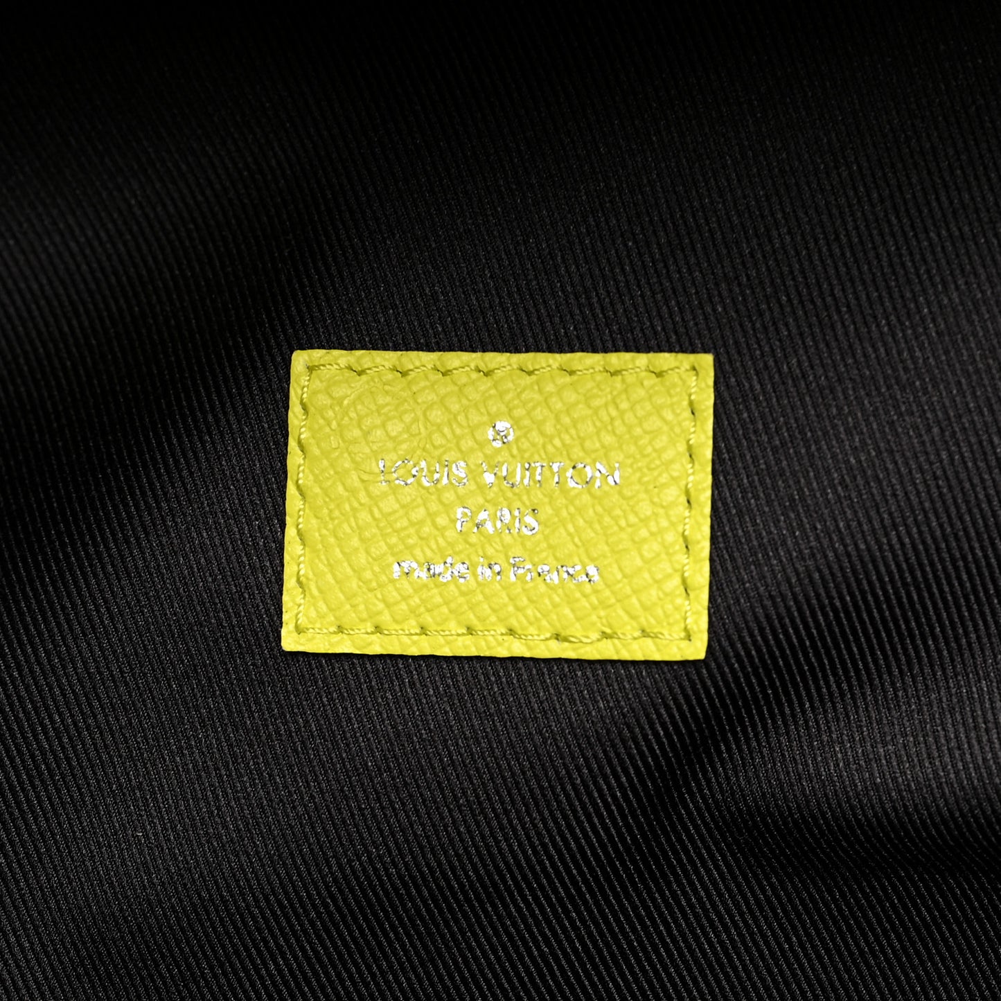 Taiga Monogram Discovery Backpack PM Yellow