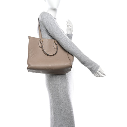 Louis Vuitton Empreinte Monogram Giant Onthego MM Tourterelle 2 of 18