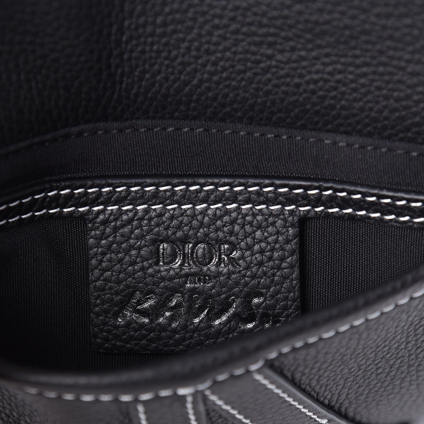 X KAWS Grained Calfskin Bee Saddle Pouch Black